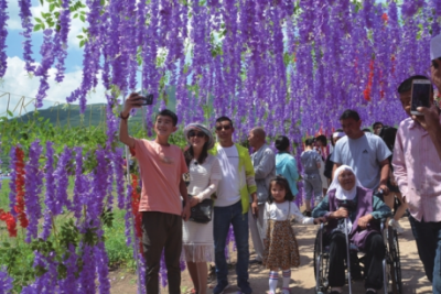 笑起来真好看｜把纸上的规划“绣”在大地上