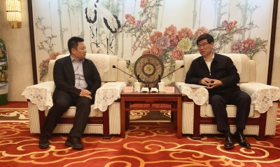 李猛会见中睿信公司客人