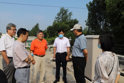 北京师范大学教授王金生到省地矿局水文二队示范工程考察交流