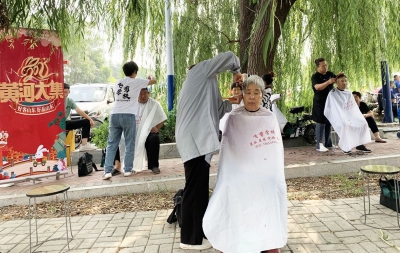 天衢新区宋官屯街道艾家坊社区：便民义剪进大集